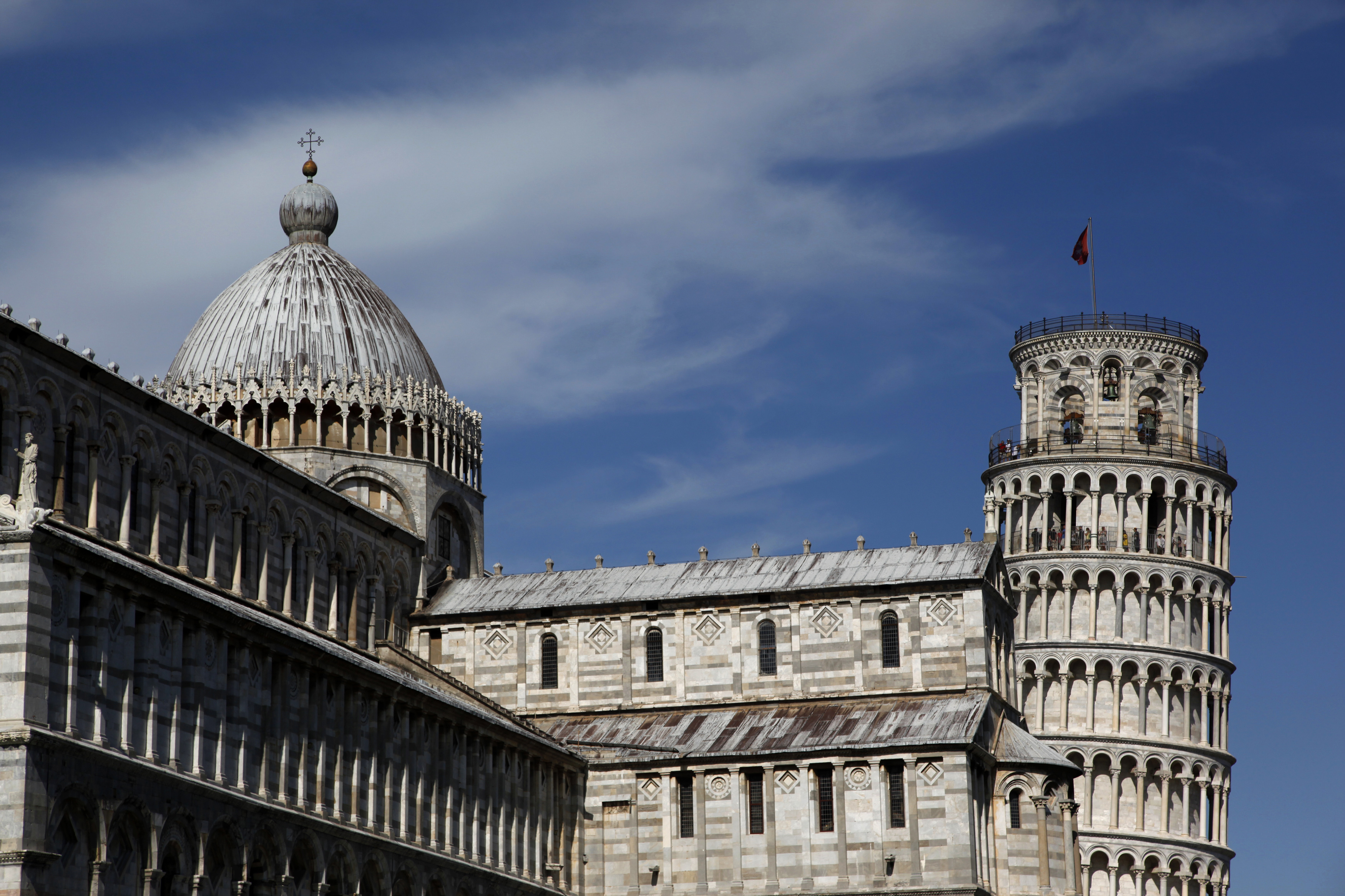 The Leaning Tower of Pisa is seen behind the Cathedral
