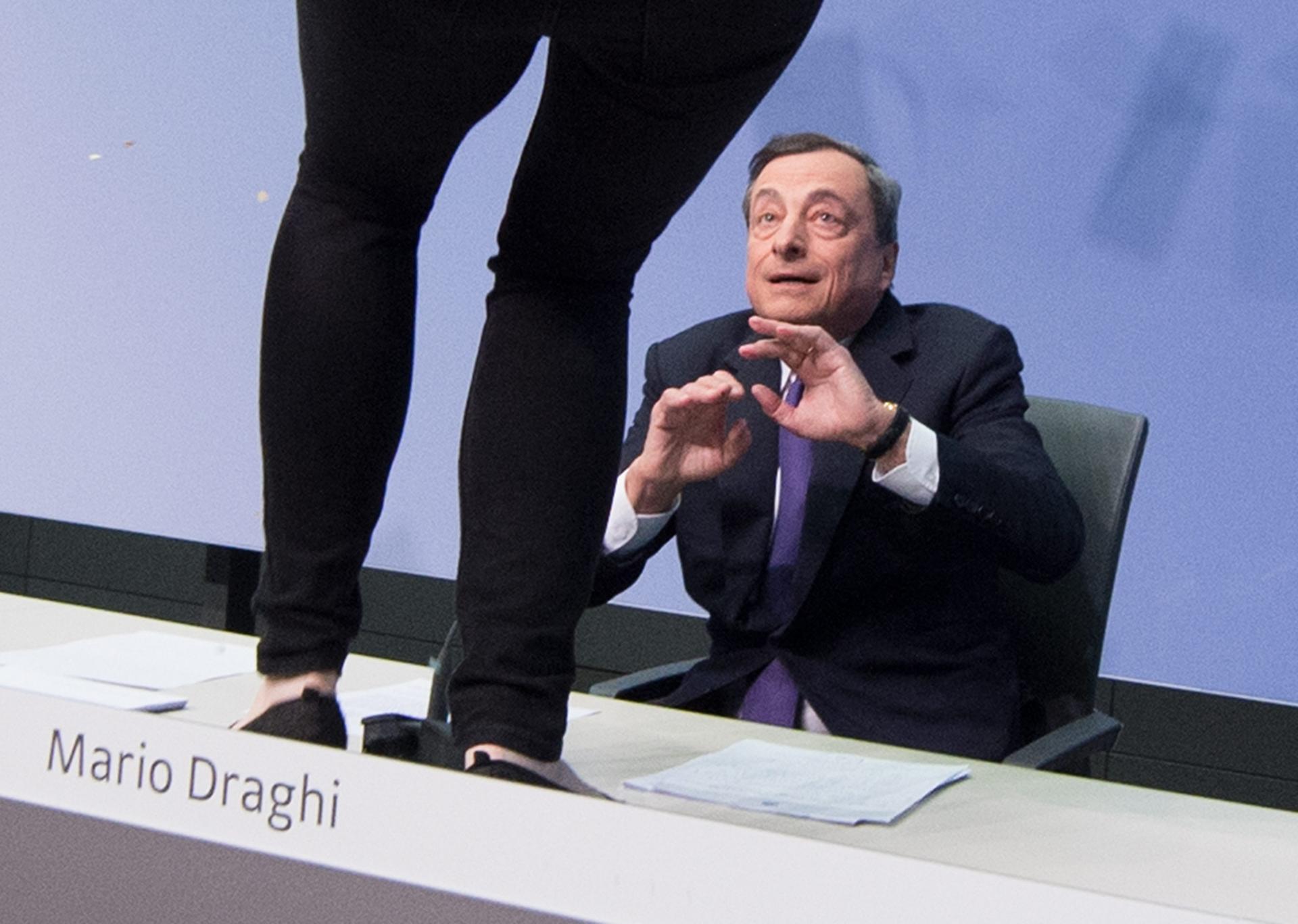 Draghi resumes ECB press conference after being attacked by protester