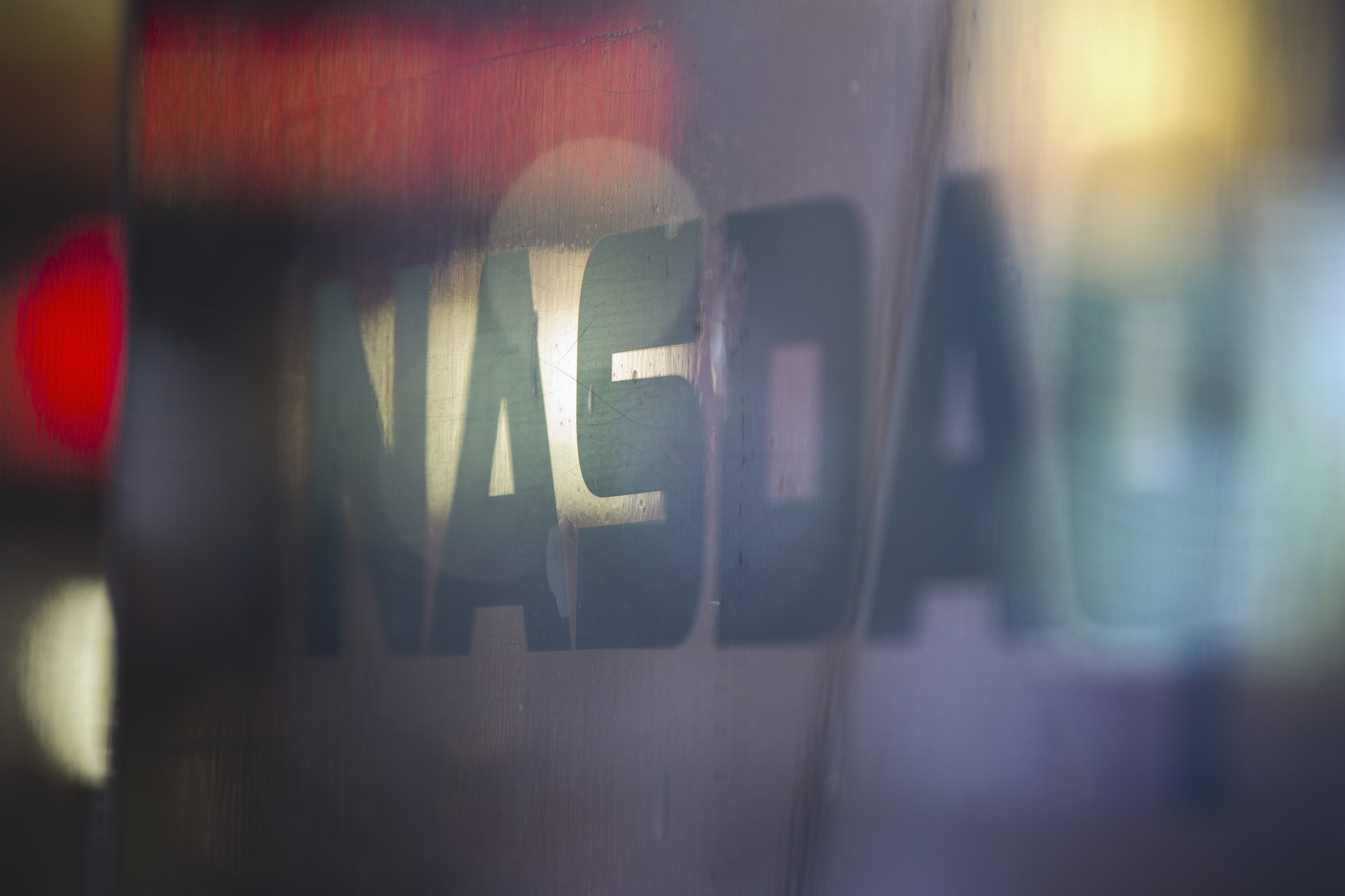 A logo is seen on a window outside of the Nasdaq MarketSite building in New York's Times Square
